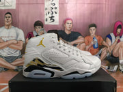 Side profile of a white high-top sneaker with yellow and black accents