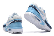 Rear and outsole views of the Nike Air Max sneakers, showing the heel cushioning and AIR MAX branding.