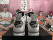 Rear view showing the speckled grey heel panels and visible Nike Air branding.