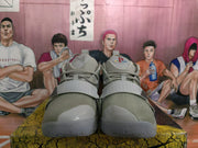 Front view of the gray Nike basketball sneakers showing the laces, forefoot straps, padded tongues, and translucent-looking toe areas.