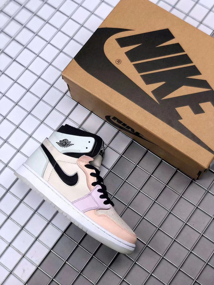 High-top pastel multicolor sneaker beside a Jordan-branded shoebox, showing peach, lavender, white, and black panels.