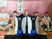 Rear view of white and blue Jordan sneakers with number 23 heel details