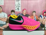 Close side view showing the pink upper, black panel, and Air Zoom marking on the midsole.