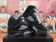Angled view of the pair showing their side panels, white laces, and translucent blue-tinted outsole.