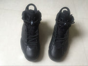 Front-facing view of the pair showing perforated toe boxes, tongues, laces, and padded collars.