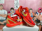 Angled view showing the textured side panels, gold accents, and translucent outsoles.
