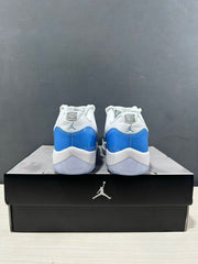 Rear view of the pair showing blue heel panels, white collars, and Jordan branding.