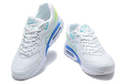 Front and angled views of white Nike Air Max sneakers with turquoise details and blue sole accents.
