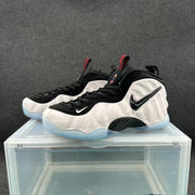 Pair of white and black high-top sneakers displayed from a front three-quarter angle on a clear case.