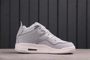 Side profile showing the low-top shape, perforated side panel, and visible sole window.
