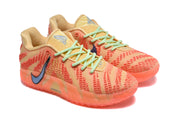 Angled view of the orange Nike sneakers highlighting the textured upper and contrasting laces.