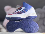 Side and outsole views highlighting the blue tread pattern