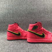 Pair of hot pink mid-top sneakers displayed from the outer sides.