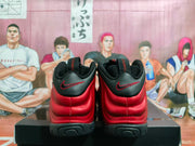 Rear view showing red padded heel panels, black collars, and red embroidered Swoosh details.