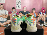 Rear view of multicolor Nike basketball shoes with patterned heel panels and striped pull tabs.