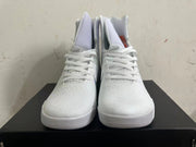 Front view of white high-top basketball shoes showing textured uppers, tongues, and white laces.