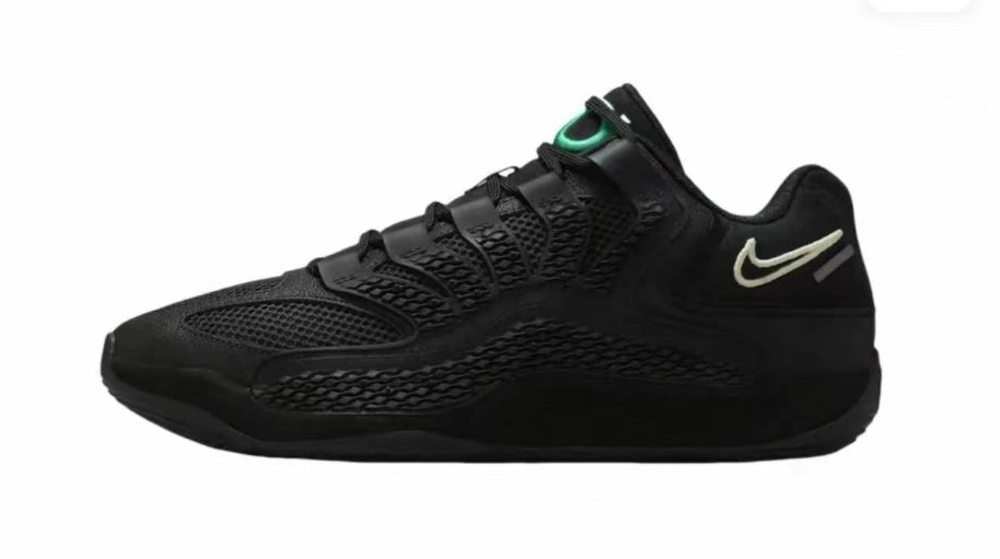 Side view of a black Nike 920-1 sneaker with textured panels, green tongue detailing, and a light-colored heel mark.