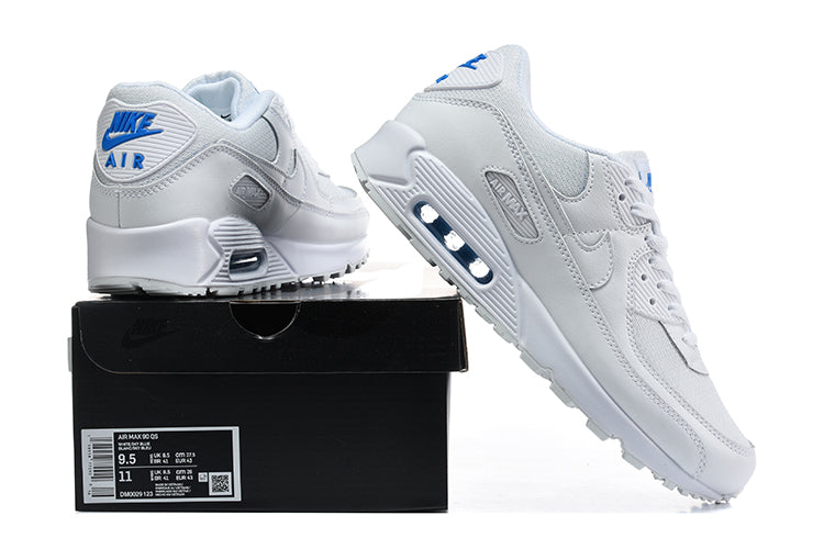 White and blue Nike Air Max 90 sneakers shown on and beside a shoebox; the box label shows a sample size.