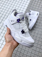 Front three-quarter view showing white laces, mesh panels and purple lace hardware.