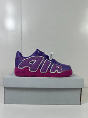 Side view highlighting the oversized AIR lettering with white edging and contrasting sole.