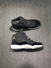 Pair of black high-top sneakers shown in side and top views against a gray textured background.