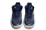 Front view of navy and gray Nike Giannis Immortality 7 shoes