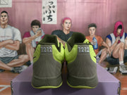Rear view of lime green and dark olive-gray Nike sneakers showing padded collars and heel detailing.