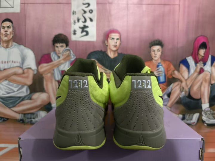Rear view of lime green and dark olive-gray Nike sneakers showing padded collars and heel detailing.