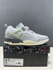 Side profile of a Jordan Spizike Low sneaker with the box label visible, showing style code FQ1759 401 and size markings including EUR 41.
