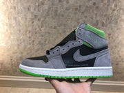 Full side profile of the grey, black and green high-top sneaker with white midsole.