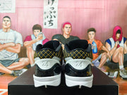 Rear view of the shoes showing black-and-gold collar details and heel panels marked 24.