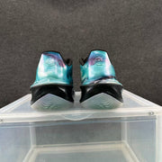 Rear view of the basketball shoes showing blue-purple heels and black heel sections