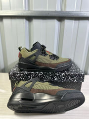 Angled view showing the sneaker's layered upper, mesh side panel, black laces, and outsole.