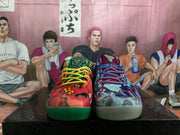 Front view highlighting the different graphic patterns, lace colors, toe boxes, and contrasting outsole colors of the mismatched pair.