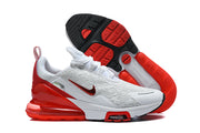 Nike Air Max 270 Premium sneakers shown from the side and outsole, with red and black tread details.
