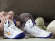 Front three-quarter view of the white and purple high-top sneaker pair with gold Swoosh details.