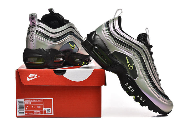 Nike Air Max 97 sneakers in silver, black, and green, displayed with a box; the box label shows a sample size of 7.