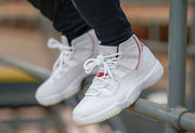 Worn elevated angle showing the sneaker profile and outsole edge.