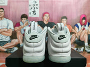 Rear view showing Nike branding and Foamposite heel tabs