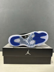 Bottom view showing the translucent outsole with blue traction sections and a dark midfoot panel.