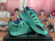 Angled view of a pair of gray-green Nike sneakers displayed on a patterned box.
