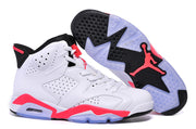 White and red high-top sneaker shown beside its outsole, featuring a translucent black and lavender traction pattern.