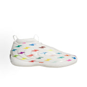 Angled front view of white high-top Adidas shoes with colorful lightning-bolt pattern