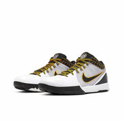 White Nike Kobe 4 basketball sneakers with black and gold Swoosh branding and patterned collar details.