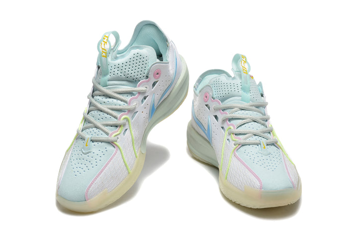 Pair of white and pastel blue Nike basketball shoes with pink and yellow-green accents, shown from the front.
