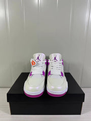 Front view of the pair showing white laces, mesh tongues, and violet accents.