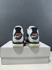 Rear view showing black heel panels, colorful Jordan branding, and contrasting soles.
