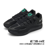 Pair of all-black basketball sneakers with green tongue accents; image text identifies style 8805-1 and sizes 40-46.