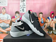 Pair of black Nike basketball shoes shown from the side, with white Swooshes and patterned heel panels.