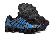 Blue and black Nike Shox-style sneakers shown with the outsole visible.